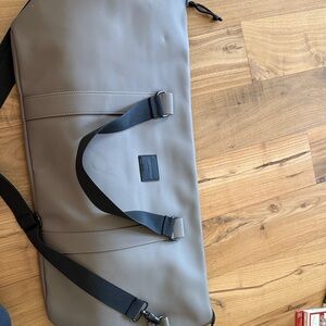 Duchamp Rubberized luggage tote bag